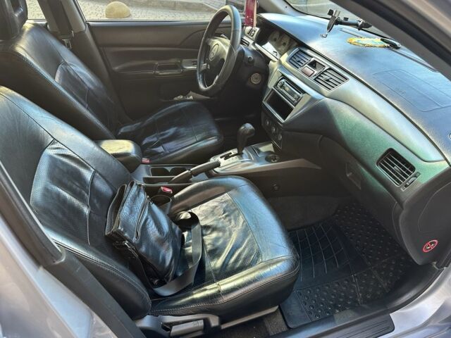 Мицубиси Лансер 2006 в Одессе на Automoto.ua Серый Мицубиси Лансер, объемом двигателя 1.6 л и пробегом 240 тыс. км за 4900 $, фото 5 на Automoto.ua