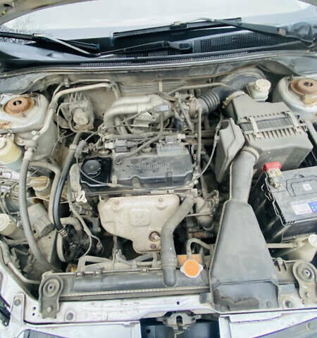 Серый Мицубиси Лансер, объемом двигателя 1.6 л и пробегом 253 тыс. км за 2850 $, фото 16 на Automoto.ua