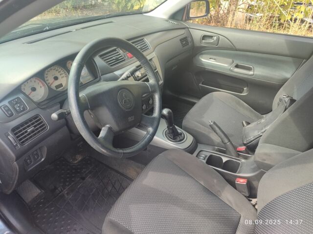 Сірий Міцубісі Lancer, об'ємом двигуна 1.6 л та пробігом 240 тис. км за 4400 $, фото 5 на Automoto.ua