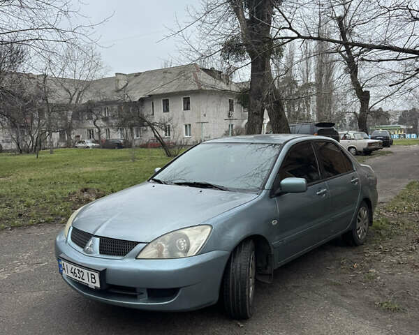Сірий Міцубісі Lancer, об'ємом двигуна 1.6 л та пробігом 240 тис. км за 3000 $, фото 11 на Automoto.ua