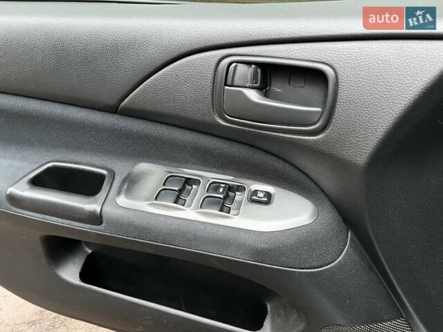 Сірий Міцубісі Lancer, об'ємом двигуна 1.58 л та пробігом 308 тис. км за 3700 $, фото 19 на Automoto.ua