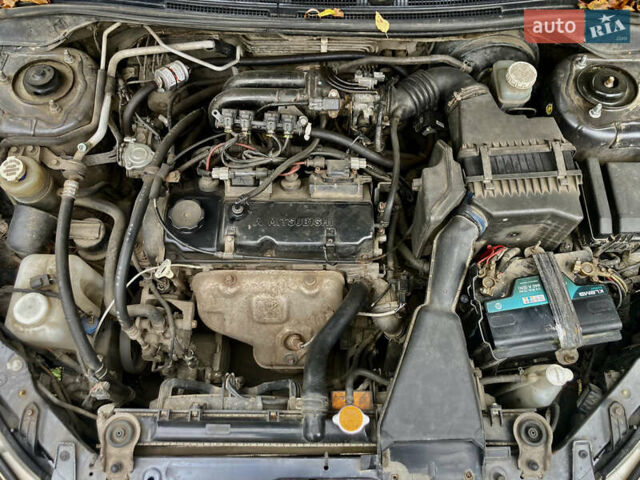 Сірий Міцубісі Lancer, об'ємом двигуна 1.6 л та пробігом 222 тис. км за 4900 $, фото 12 на Automoto.ua