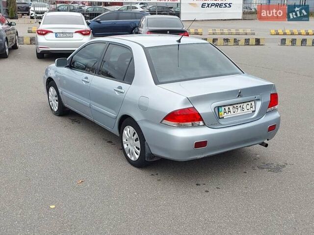 Мицубиси Лансер 2006 в Киеве на Automoto.ua Серый Мицубиси Лансер, объемом двигателя 1.6 л и пробегом 426 тыс. км за 3800 $, фото 6 на Automoto.ua