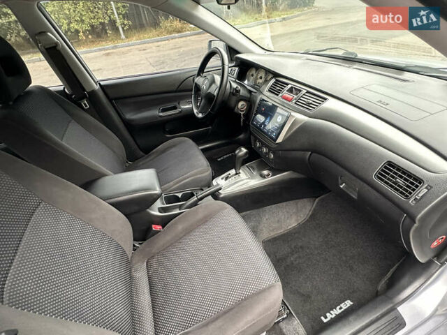 Серый Мицубиси Лансер, объемом двигателя 1.58 л и пробегом 183 тыс. км за 4800 $, фото 27 на Automoto.ua