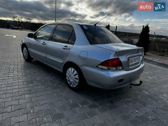 Серый Мицубиси Лансер, объемом двигателя 1.58 л и пробегом 333 тыс. км за 2700 $, фото 8 на Automoto.ua