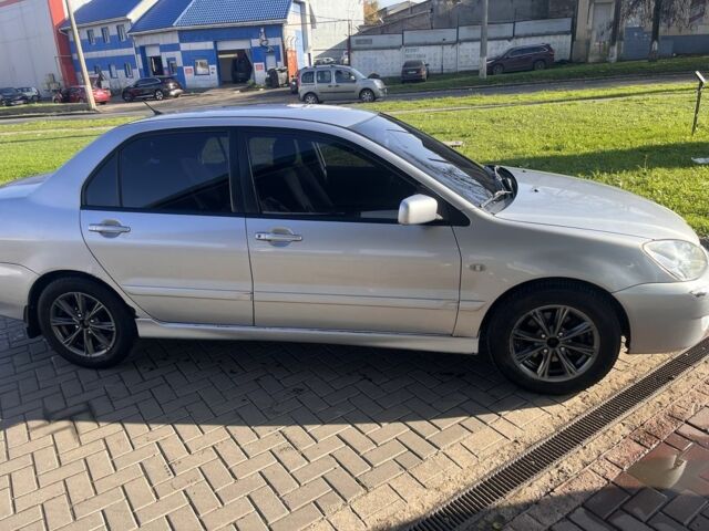 Серый Мицубиси Лансер, объемом двигателя 1.6 л и пробегом 524 тыс. км за 3800 $, фото 5 на Automoto.ua