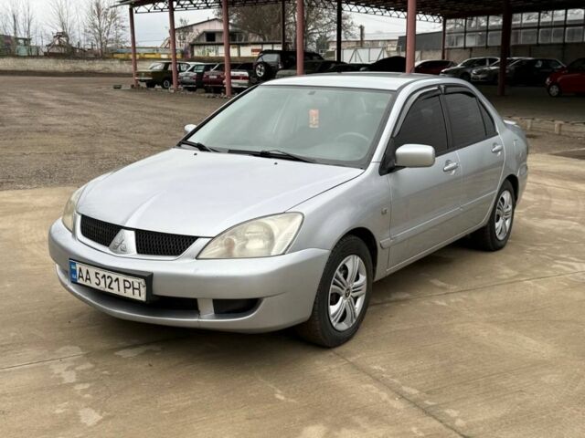 Сірий Міцубісі Lancer, об'ємом двигуна 1.6 л та пробігом 220 тис. км за 2450 $, фото 2 на Automoto.ua