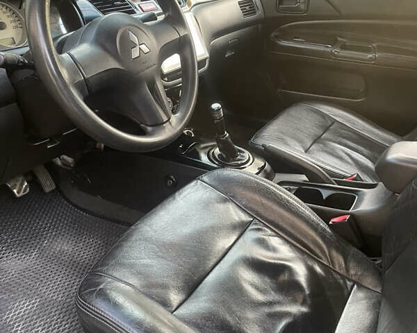 Сірий Міцубісі Lancer, об'ємом двигуна 1.6 л та пробігом 244 тис. км за 2999 $, фото 9 на Automoto.ua