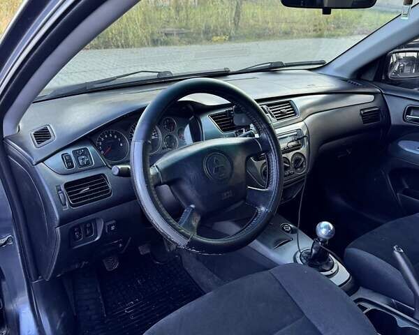 Мицубиси Лансер 2006 в Черновцах на Automoto.ua Серый Мицубиси Лансер, объемом двигателя 1.6 л и пробегом 299 тыс. км за 4300 $, фото 7 на Automoto.ua