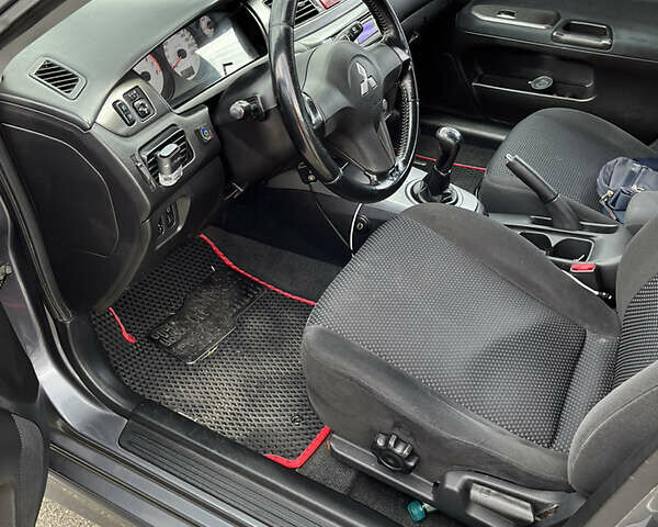 Сірий Міцубісі Lancer, об'ємом двигуна 1.6 л та пробігом 260 тис. км за 4998 $, фото 3 на Automoto.ua