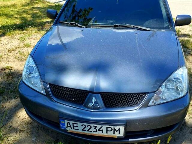 Сірий Міцубісі Lancer, об'ємом двигуна 1.6 л та пробігом 168 тис. км за 5300 $, фото 1 на Automoto.ua