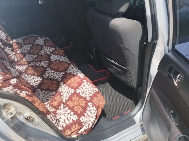 Серый Мицубиси Лансер, объемом двигателя 2 л и пробегом 306 тыс. км за 4100 $, фото 3 на Automoto.ua