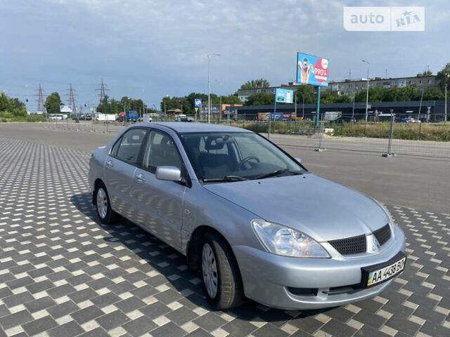 Сірий Міцубісі Lancer, об'ємом двигуна 1.6 л та пробігом 236 тис. км за 4999 $, фото 7 на Automoto.ua