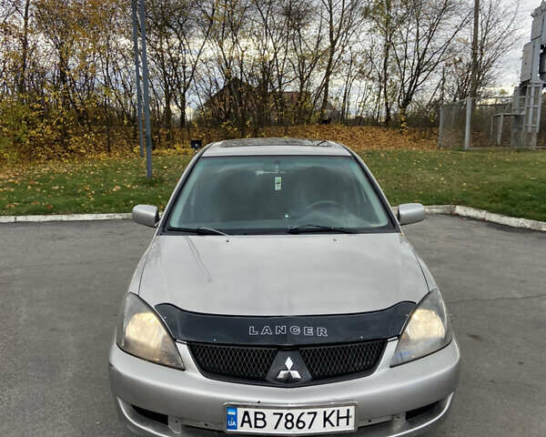 Мицубиси Лансер 2006 в Погребище на Automoto.ua Серый Мицубиси Лансер, объемом двигателя 2 л и пробегом 320 тыс. км за 3300 $, фото 4 на Automoto.ua