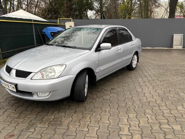 Серый Мицубиси Лансер, объемом двигателя 1.6 л и пробегом 260 тыс. км за 4999 $, фото 3 на Automoto.ua