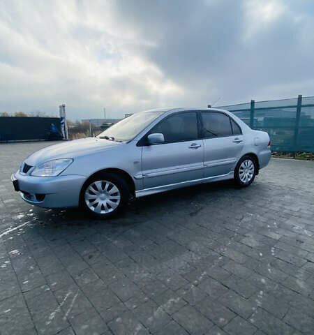 Серый Мицубиси Лансер, объемом двигателя 1.6 л и пробегом 253 тыс. км за 2850 $, фото 10 на Automoto.ua