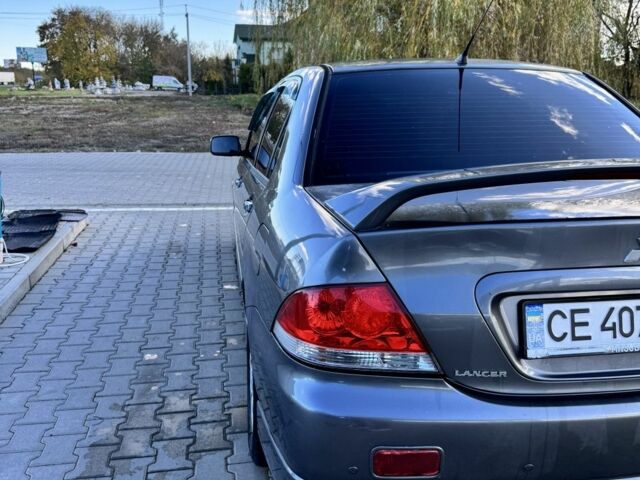 Мицубиси Лансер 2006 в Черновцах на Automoto.ua Серый Мицубиси Лансер, объемом двигателя 1.6 л и пробегом 263 тыс. км за 4500 $, фото 6 на Automoto.ua