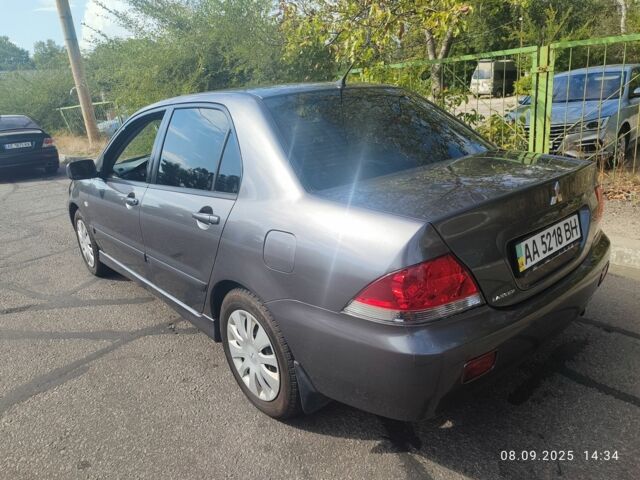 Сірий Міцубісі Lancer, об'ємом двигуна 1.6 л та пробігом 240 тис. км за 4400 $, фото 2 на Automoto.ua