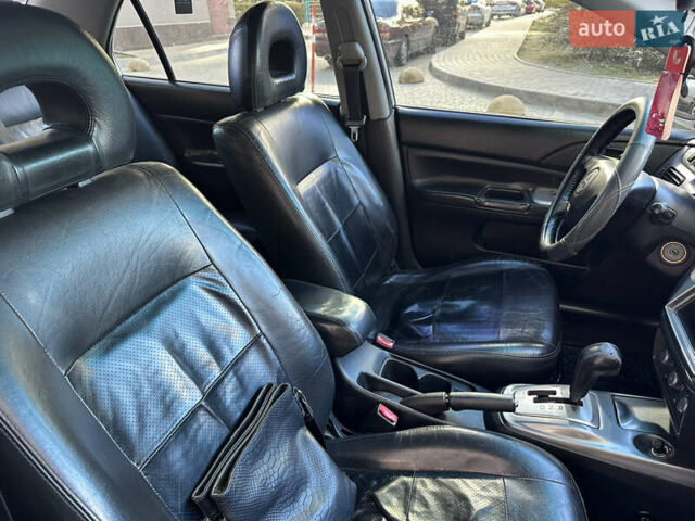 Серый Мицубиси Лансер, объемом двигателя 1.58 л и пробегом 244 тыс. км за 4950 $, фото 14 на Automoto.ua