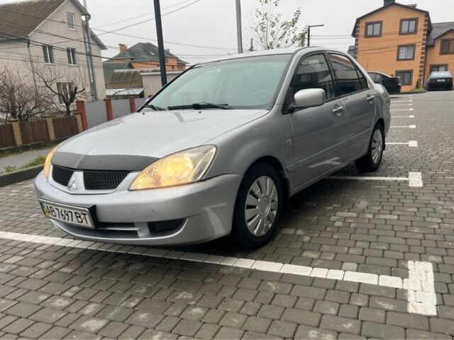 Серый Мицубиси Лансер, объемом двигателя 1.6 л и пробегом 333 тыс. км за 2800 $, фото 2 на Automoto.ua