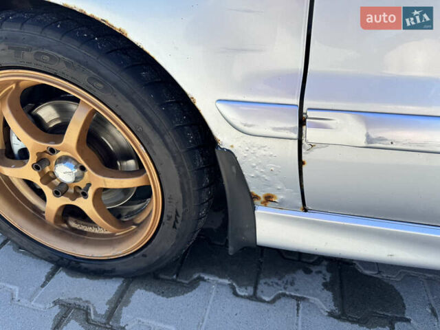 Мицубиси Лансер 2006 в Львове на Automoto.ua Серый Мицубиси Лансер, объемом двигателя 2 л и пробегом 272 тыс. км за 4999 $, фото 15 на Automoto.ua