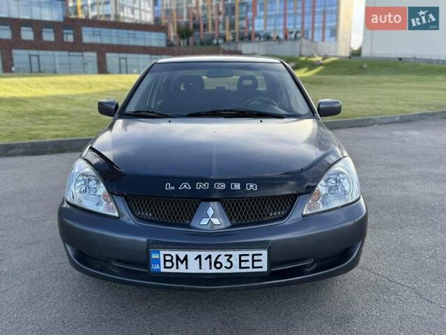 Сірий Міцубісі Lancer, об'ємом двигуна 1.58 л та пробігом 267 тис. км за 3999 $, фото 3 на Automoto.ua