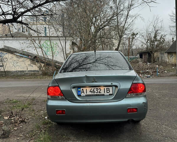 Сірий Міцубісі Lancer, об'ємом двигуна 1.6 л та пробігом 240 тис. км за 3000 $, фото 5 на Automoto.ua