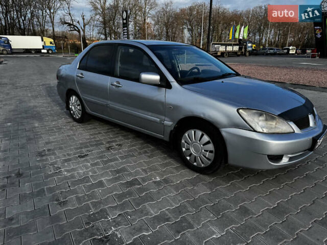 Сірий Міцубісі Lancer, об'ємом двигуна 1.58 л та пробігом 333 тис. км за 2700 $, фото 2 на Automoto.ua