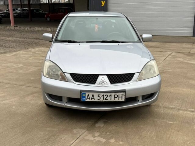 Сірий Міцубісі Lancer, об'ємом двигуна 1.6 л та пробігом 220 тис. км за 2450 $, фото 1 на Automoto.ua