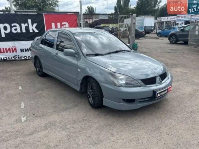 Сірий Міцубісі Lancer, об'ємом двигуна 2 л та пробігом 263 тис. км за 4300 $, фото 2 на Automoto.ua