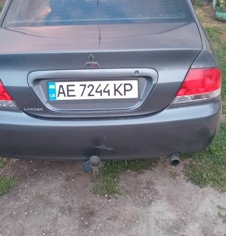 Серый Мицубиси Лансер, объемом двигателя 1.6 л и пробегом 270 тыс. км за 3700 $, фото 2 на Automoto.ua