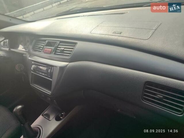 Сірий Міцубісі Lancer, об'ємом двигуна 1.6 л та пробігом 242 тис. км за 4900 $, фото 51 на Automoto.ua
