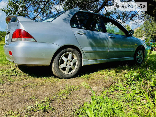 Сірий Міцубісі Lancer, об'ємом двигуна 1.6 л та пробігом 203 тис. км за 5000 $, фото 8 на Automoto.ua