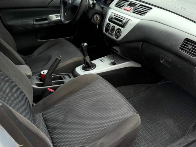 Сірий Міцубісі Lancer, об'ємом двигуна 1.6 л та пробігом 220 тис. км за 2450 $, фото 8 на Automoto.ua