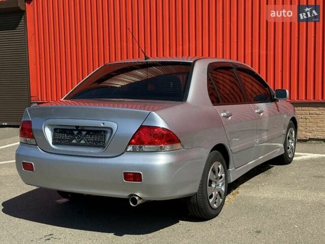 Серый Мицубиси Лансер, объемом двигателя 0 л и пробегом 182 тыс. км за 6500 $, фото 8 на Automoto.ua