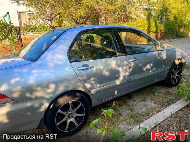 Сірий Міцубісі Lancer, об'ємом двигуна 1.6 л та пробігом 36 тис. км за 3500 $, фото 4 на Automoto.ua