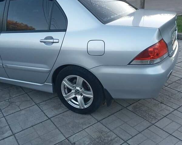 Мицубиси Лансер 2006 в Каменское - Днепродзержинск на Automoto.ua Серый Мицубиси Лансер, объемом двигателя 1.58 л и пробегом 238 тыс. км за 5400 $, фото 2 на Automoto.ua