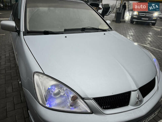 Сірий Міцубісі Lancer, об'ємом двигуна 2 л та пробігом 187 тис. км за 4500 $, фото 15 на Automoto.ua