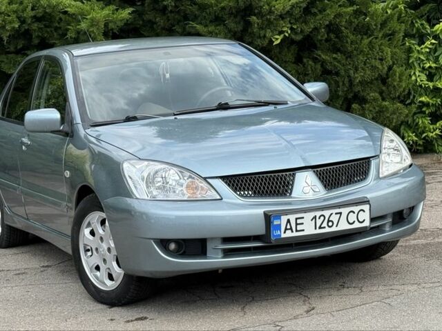 Серый Мицубиси Лансер, объемом двигателя 1.6 л и пробегом 220 тыс. км за 4400 $, фото 7 на Automoto.ua