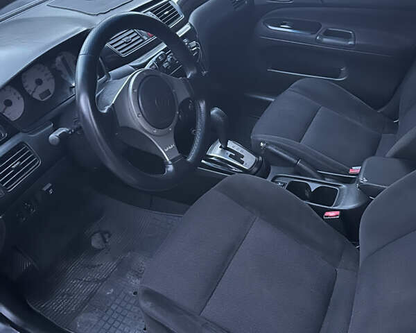 Сірий Міцубісі Lancer, об'ємом двигуна 2 л та пробігом 200 тис. км за 4999 $, фото 12 на Automoto.ua
