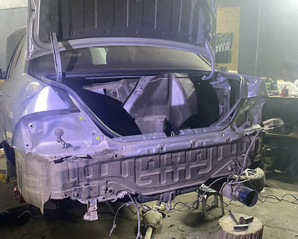 Серый Мицубиси Лансер, объемом двигателя 2 л и пробегом 256 тыс. км за 7000 $, фото 14 на Automoto.ua