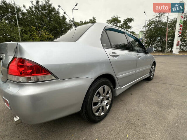 Серый Мицубиси Лансер, объемом двигателя 1.58 л и пробегом 183 тыс. км за 4800 $, фото 13 на Automoto.ua