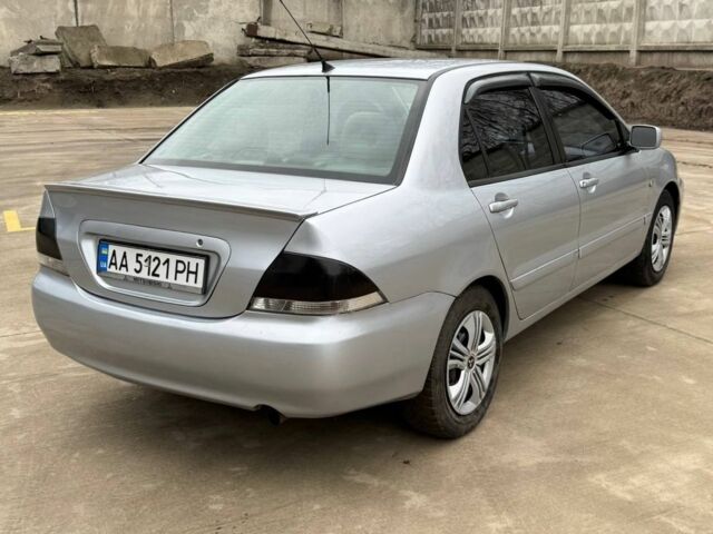 Сірий Міцубісі Lancer, об'ємом двигуна 1.6 л та пробігом 220 тис. км за 2450 $, фото 5 на Automoto.ua