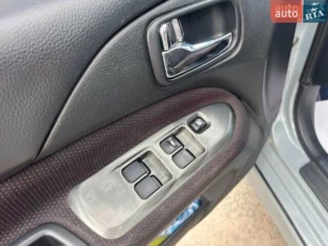 Сірий Міцубісі Lancer, об'ємом двигуна 2 л та пробігом 263 тис. км за 4300 $, фото 17 на Automoto.ua
