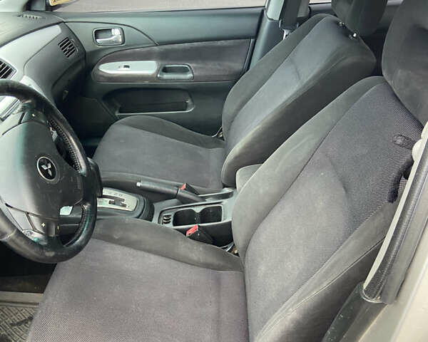 Мицубиси Лансер 2006 в Погребище на Automoto.ua Серый Мицубиси Лансер, объемом двигателя 2 л и пробегом 320 тыс. км за 3300 $, фото 10 на Automoto.ua