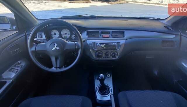 Сірий Міцубісі Lancer, об'ємом двигуна 1.6 л та пробігом 163 тис. км за 5000 $, фото 12 на Automoto.ua