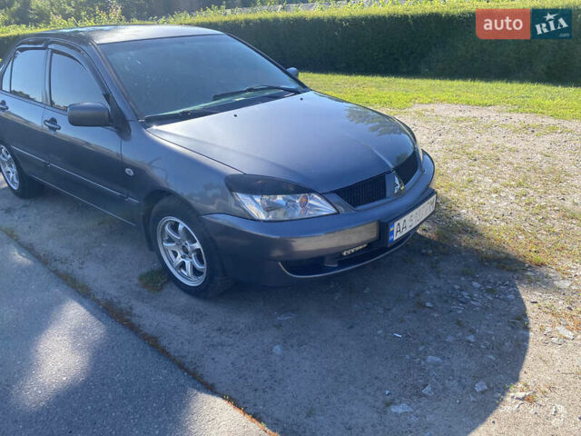 Серый Мицубиси Лансер, объемом двигателя 1.6 л и пробегом 291 тыс. км за 3900 $, фото 4 на Automoto.ua