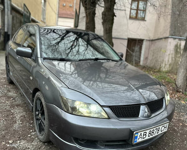 Сірий Міцубісі Lancer, об'ємом двигуна 2 л та пробігом 200 тис. км за 4999 $, фото 1 на Automoto.ua