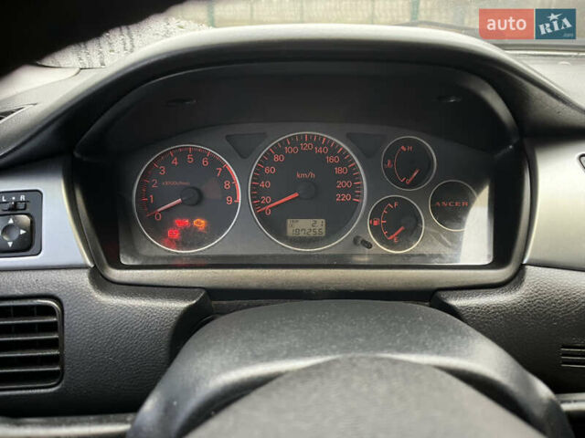 Сірий Міцубісі Lancer, об'ємом двигуна 2 л та пробігом 187 тис. км за 4500 $, фото 21 на Automoto.ua