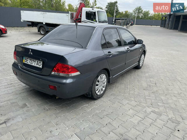 Сірий Міцубісі Lancer, об'ємом двигуна 1.58 л та пробігом 162 тис. км за 4650 $, фото 3 на Automoto.ua